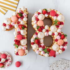 Number shape 18th birthday cakes wth strawberries, raspberries and meringues