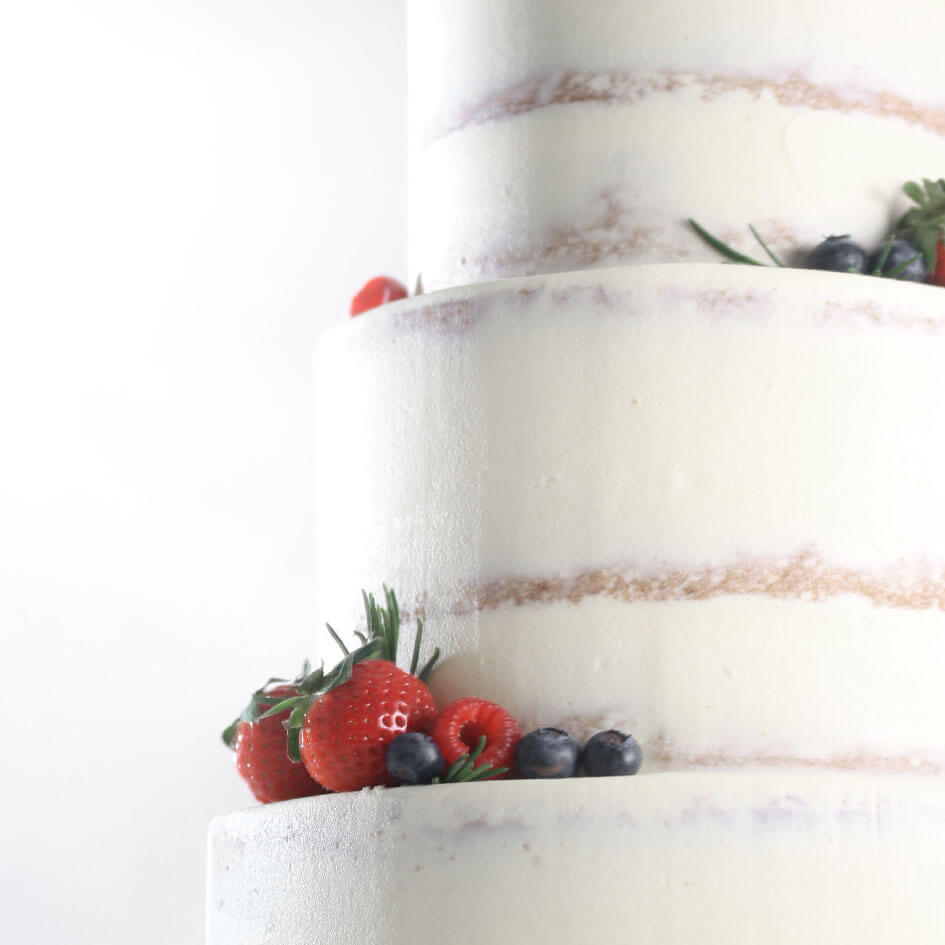 closeup_semi_naked_berries_ wedding_cake_fitzbillies.jpg__PID:b9cead33-5c9c-412e-9f92-1022b91d1613